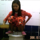 This voyeur video features 5 different women taking runny shits and pissing into a public toilet in Thailand. Apparently, the toilet has no running water, and the girls have to pour water down the drain with a plastic container. 5 minutes.